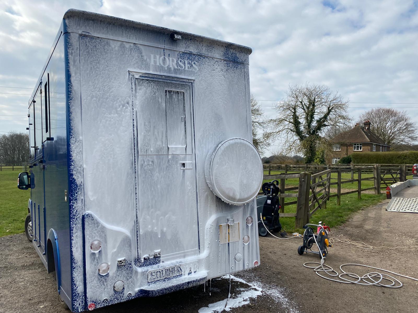 Horse box exterior being cleaned and disinfected